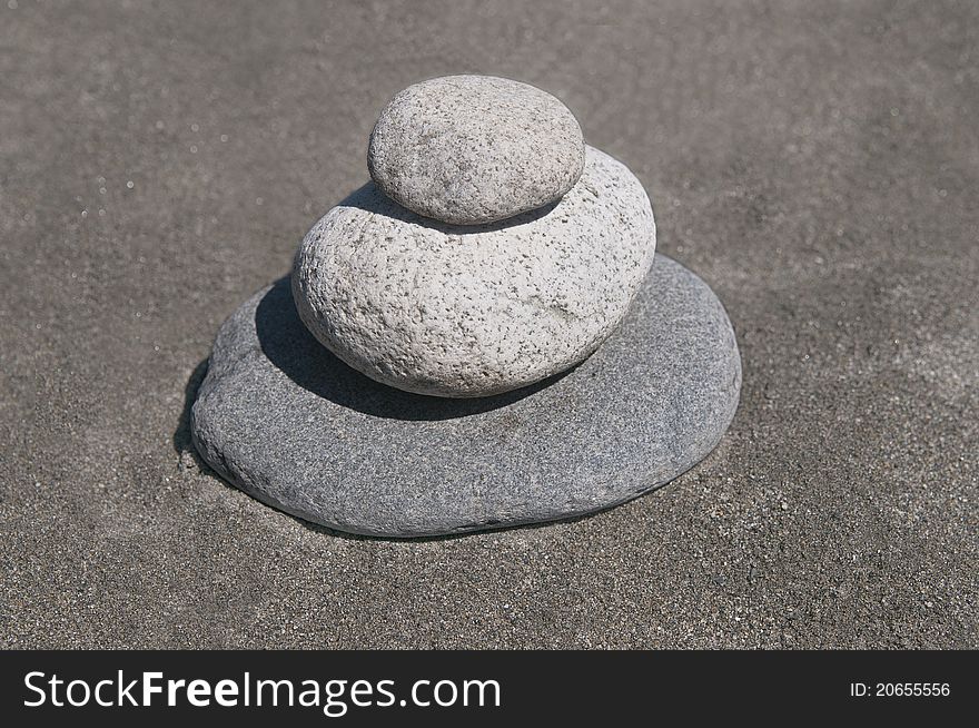 Cairn in the background of the sand. Cairn in the background of the sand