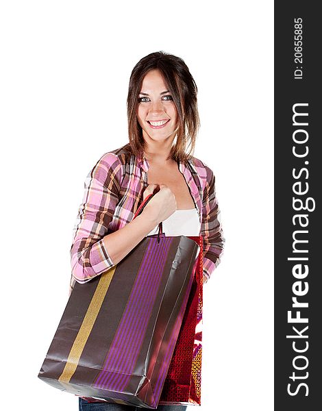 Young woman holding shopping bags. Young woman holding shopping bags