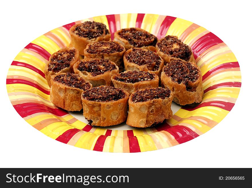 Indian spicy sweet fried snack on a colorful paper plate. Indian spicy sweet fried snack on a colorful paper plate