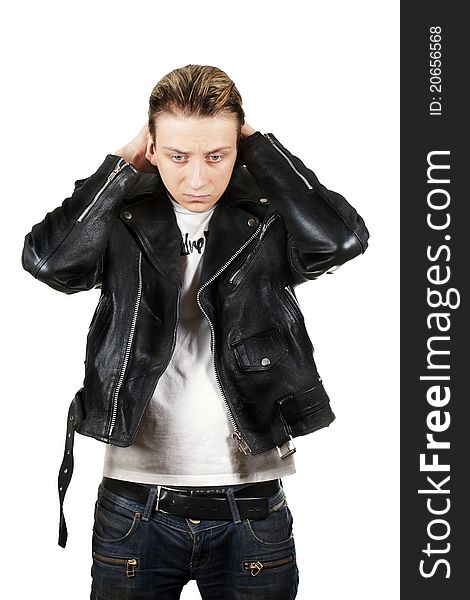 Young depressed man in black leather jacket