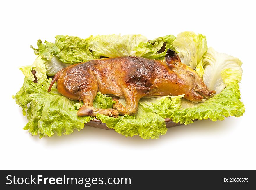 Freshly roasted pig isolated on white background. Freshly roasted pig isolated on white background