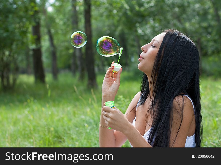 Girl Inflates The Bubbles