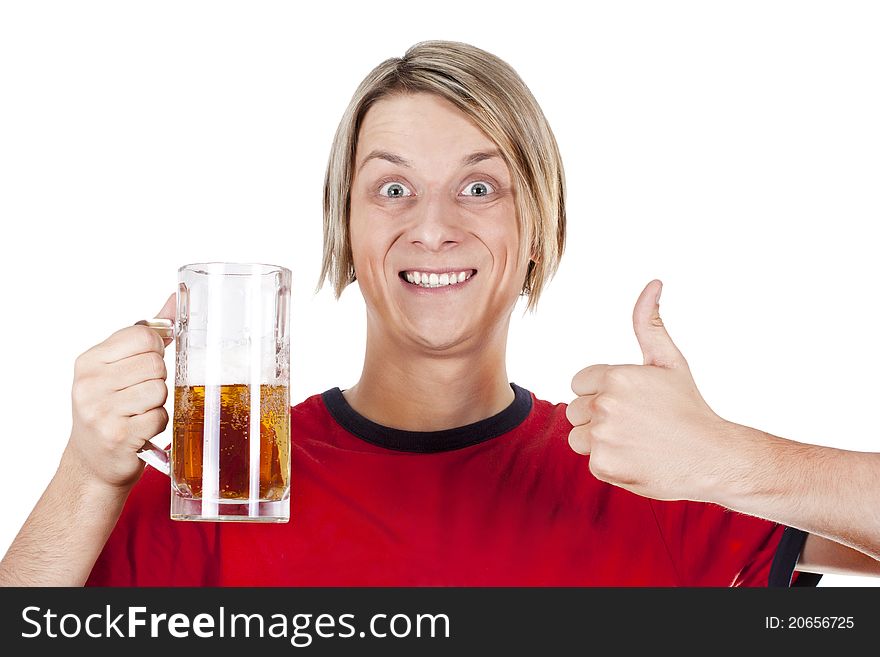 Happy young man holding beer mug