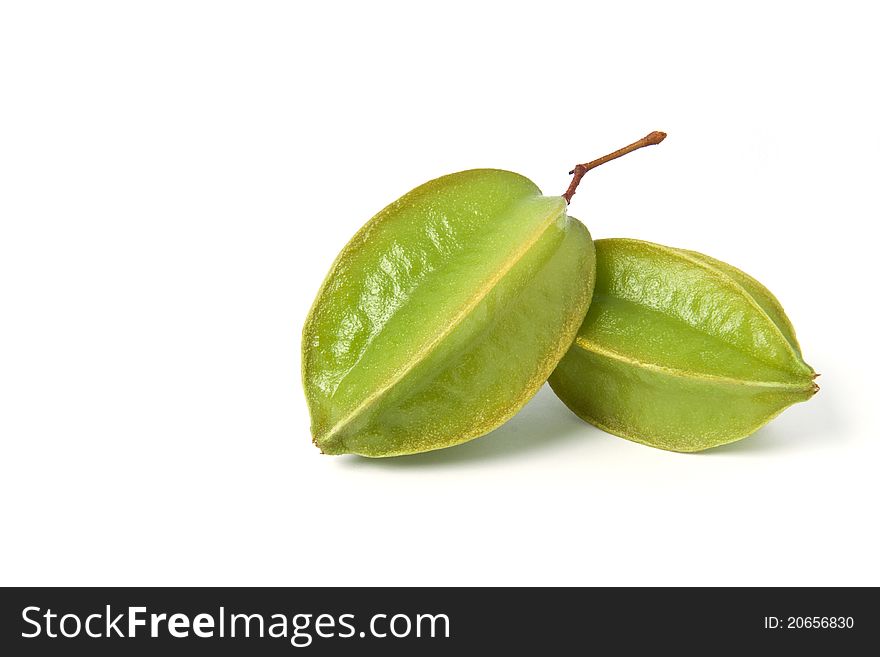 Two young starfruit in white background