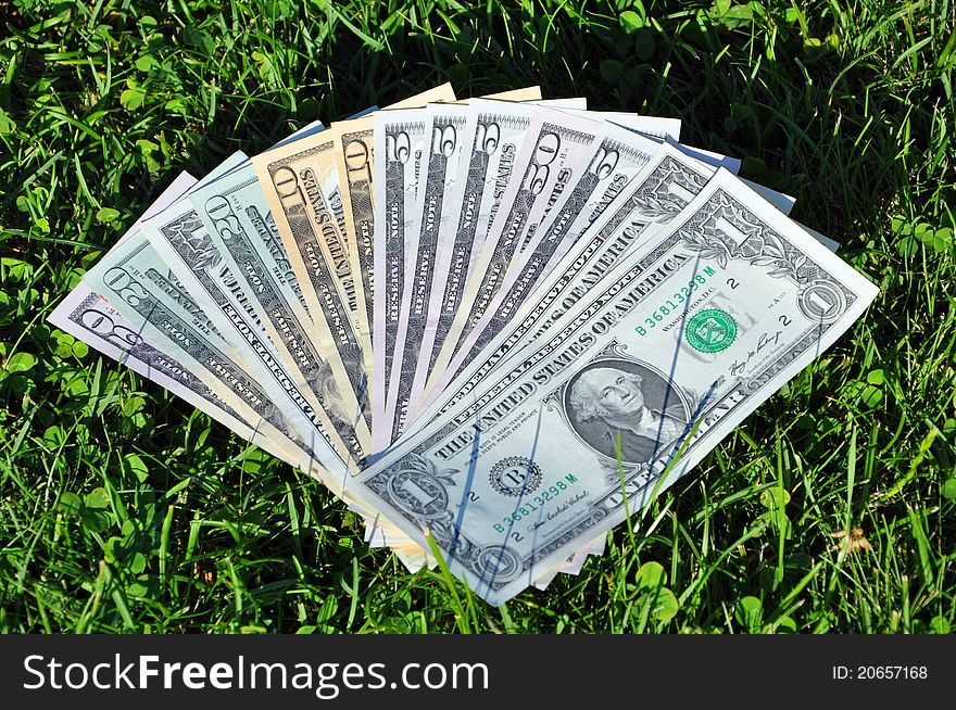 Dollars on a green background