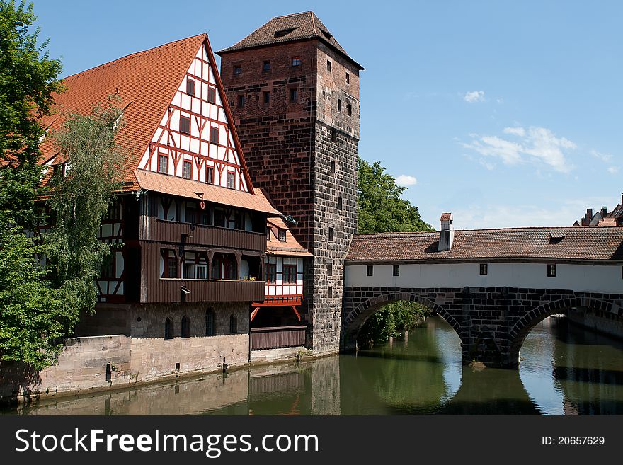 House at waterside made of sand stones and wood. House at waterside made of sand stones and wood