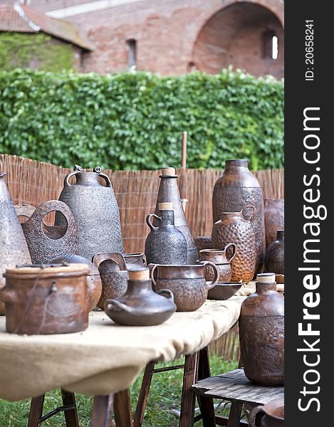 Traditional ceramics exposed on the street market of the Teutonic Order castle in Malbork (Poland). Traditional ceramics exposed on the street market of the Teutonic Order castle in Malbork (Poland).