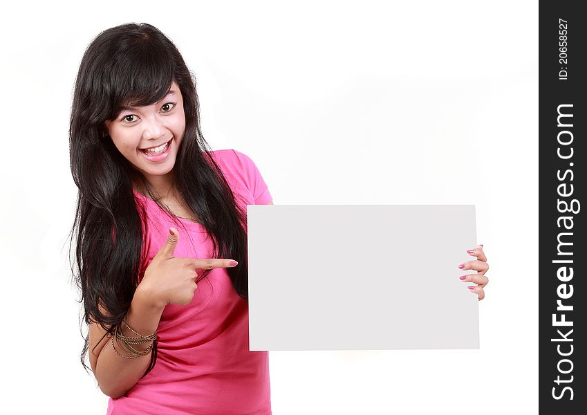 Woman pointing at a blank board isolated over white background