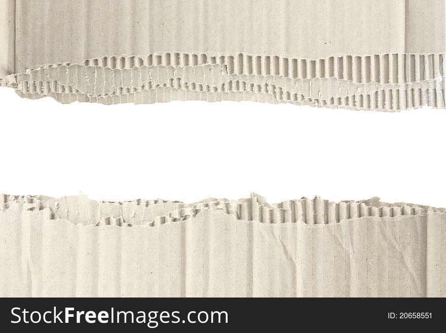 Torn corrugated cardboard isolated on white