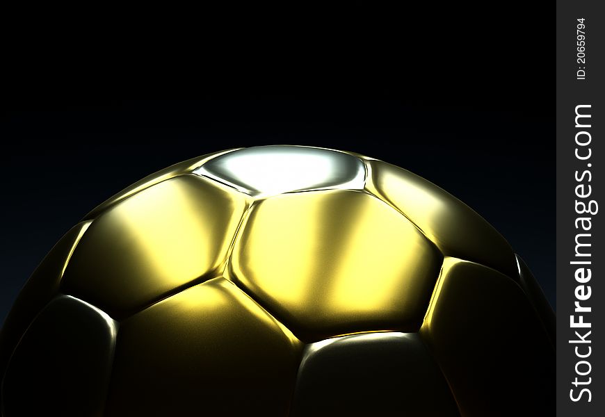 A gold soccer ball on black