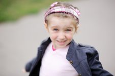 Cute Child Girl Makes Happy Smiling Face Stock Photo Cute Child Girl Makes Happy Smiling Face Stock Photo