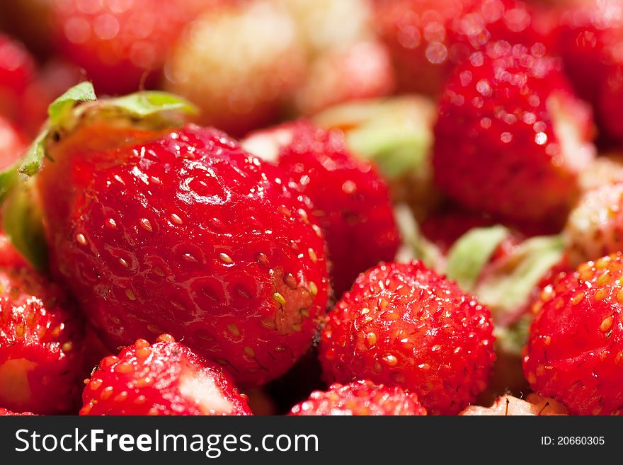 Macro view of a heap of fresh strawberries