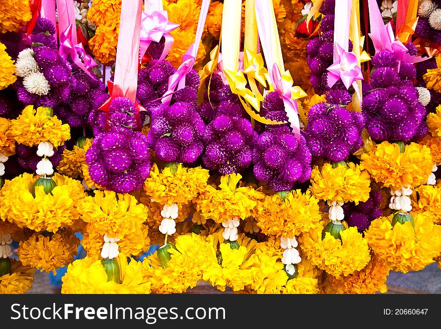 Colorful flower garland in buddhist church, Thailand