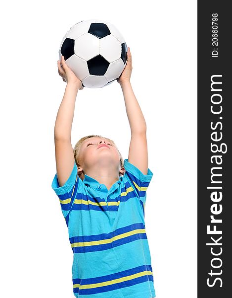 Cute boy plays with a football in studio, isolated on white. Cute boy plays with a football in studio, isolated on white