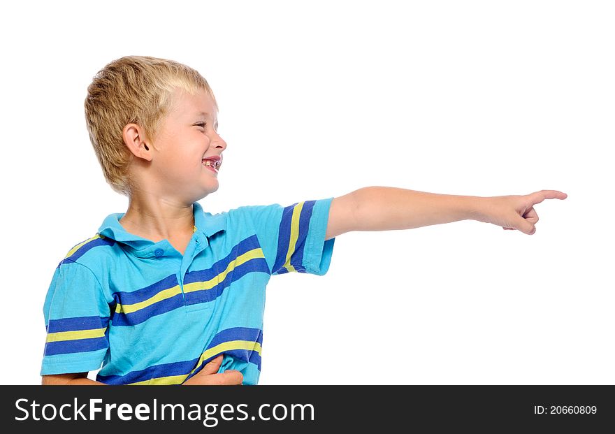 Cute boy in blue shirt pointing at something off frame. Cute boy in blue shirt pointing at something off frame