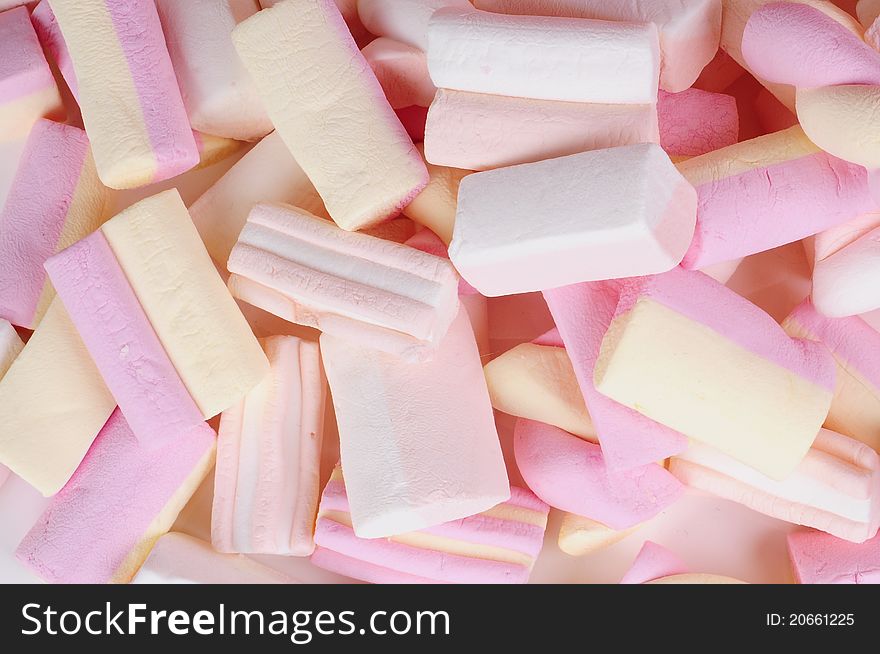 Pink white and yellow marshmallows