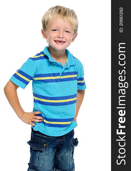Young caucasian kid smiles for a portrait in studio, isolated on white. Young caucasian kid smiles for a portrait in studio, isolated on white