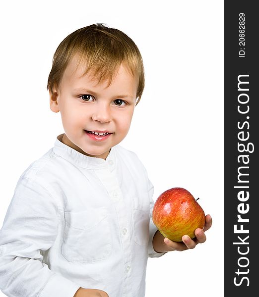 Little boy with apple isolated on white background