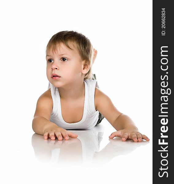 Cute little boy on a white background