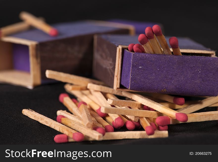 Wooden matches on black background. Wooden matches on black background