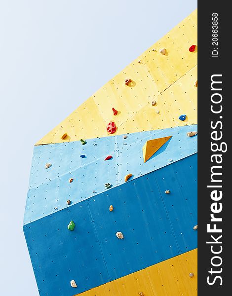 Rock climbing wall on white background