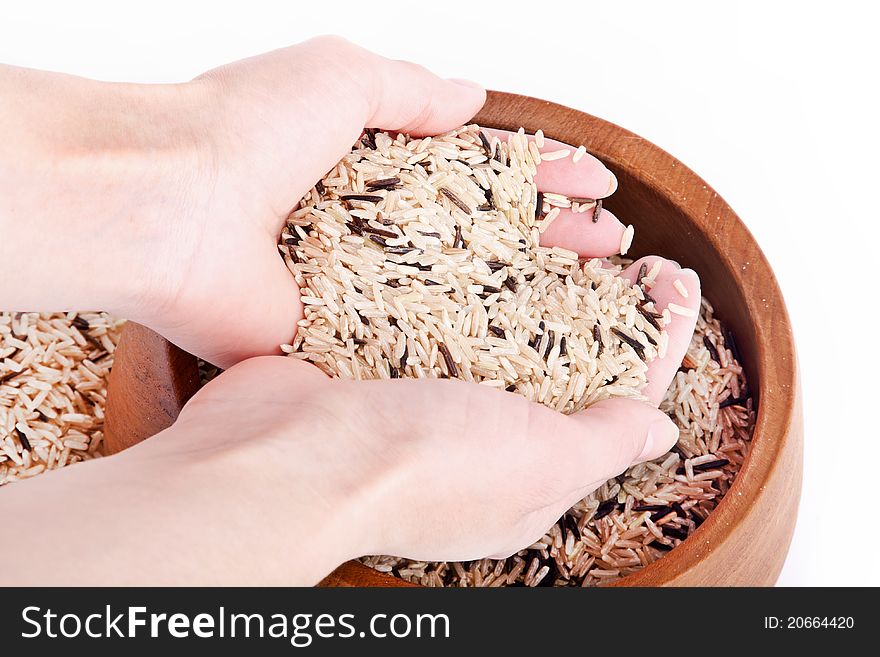 The rice in the hands on white background