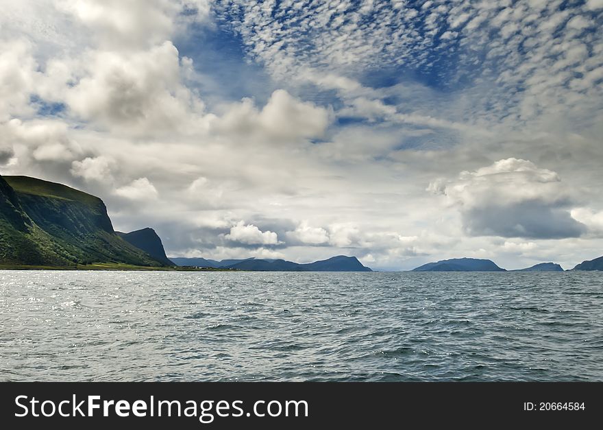This shot was taken from a boat near a famous tourist city of Alesund, Norway. This shot was taken from a boat near a famous tourist city of Alesund, Norway