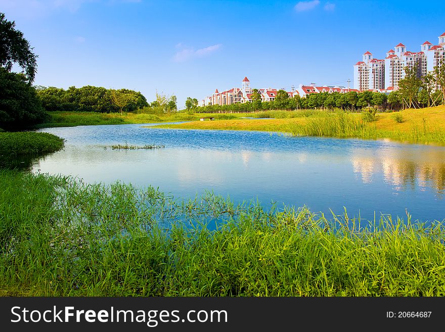 Residential, lake, lawn, and beautiful environment. Residential, lake, lawn, and beautiful environment