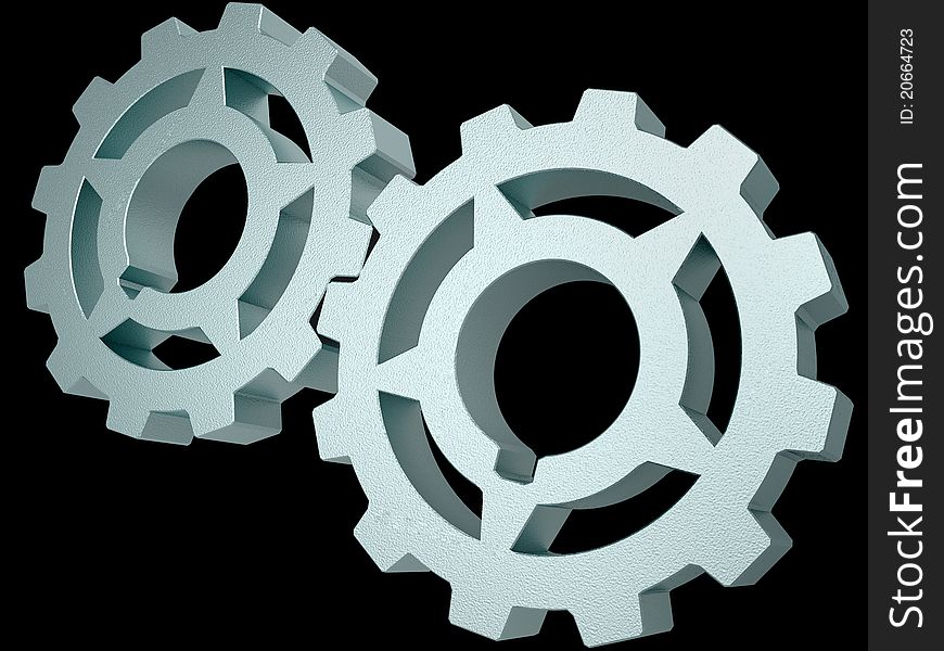 Two steel gears isolated on a black background