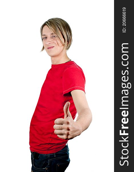 Happy young man holding a finger up