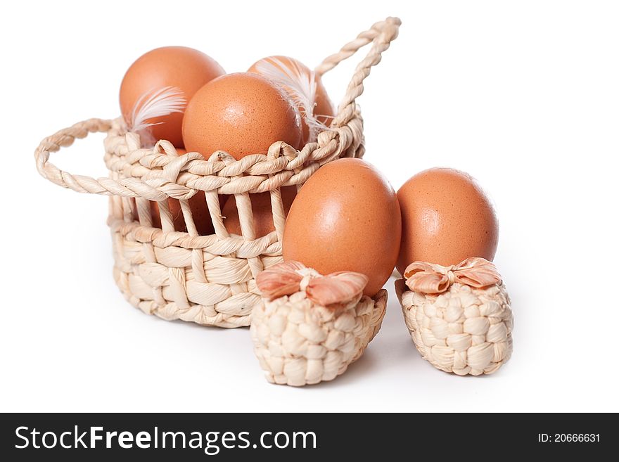 Eggs In The Basket On A White