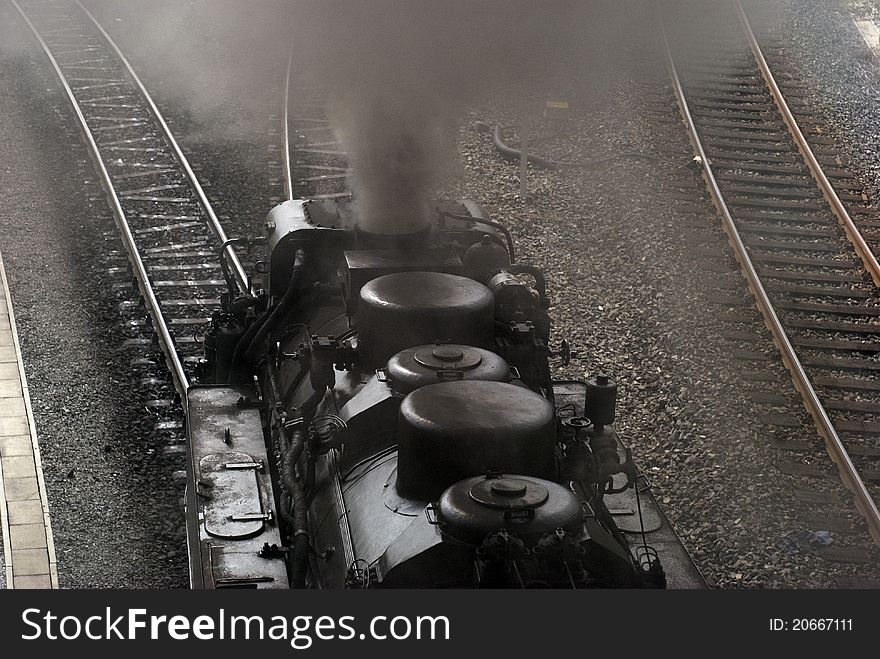 Close-up steam train from above. Leaving Wernigerode station towards Brocken in Harz, Germany.