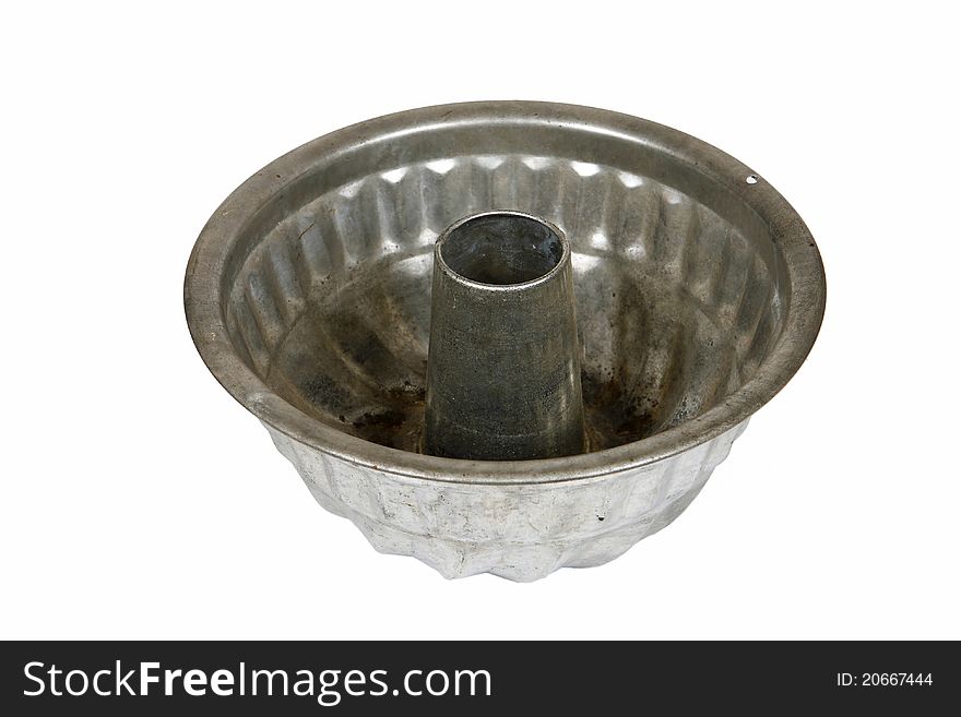 Vintage cake baking tin isolated on a white background