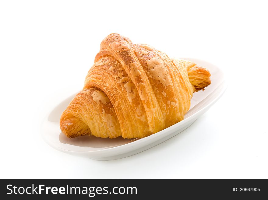 Photo of delicious tasty golden croissants on white background