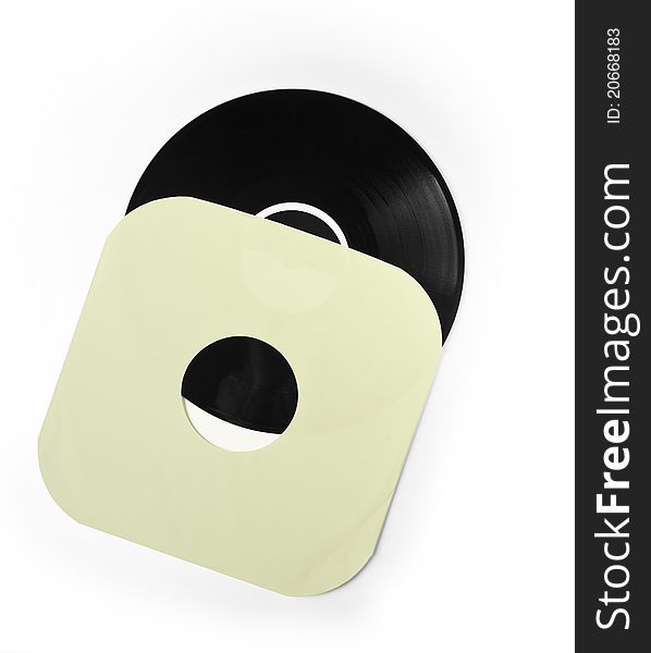 A vinyl record in a blank paper sleeve isolated. A vinyl record in a blank paper sleeve isolated