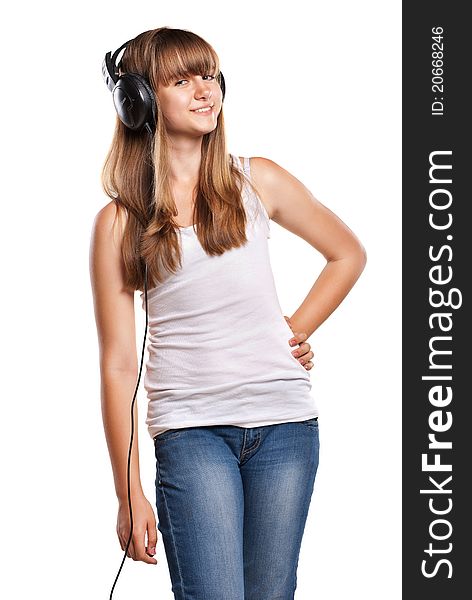 Lovely girl listening a music in headphones