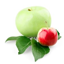 Green Apple With Leafs And Small Red Apple Stock Images