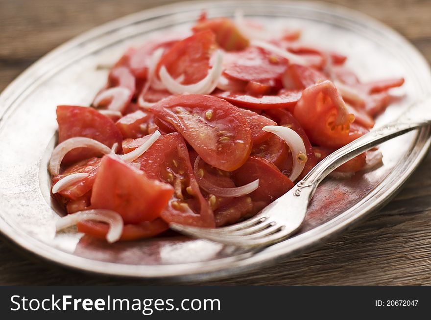 Fresh tomato with onion salad close up shoot. Fresh tomato with onion salad close up shoot