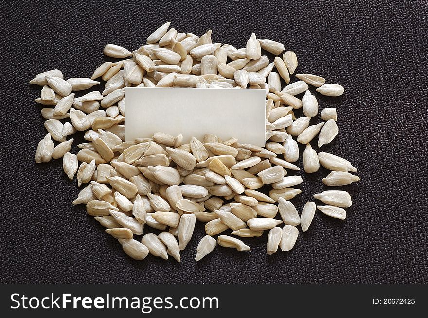 Closeup shot of sunflower seeds and blank label.