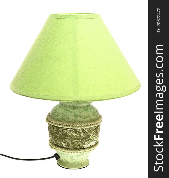 Tabletop green lamp on a white background