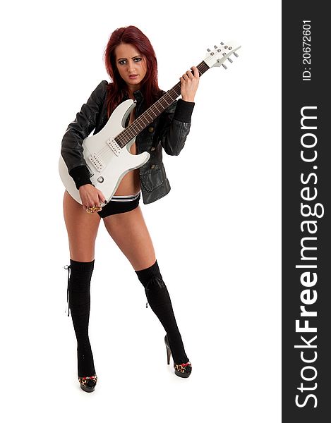 Image showing young female with guitar against white. Image showing young female with guitar against white