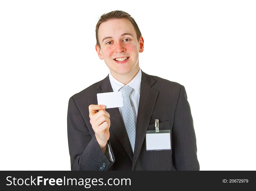 Smiley businessman showing business card over white background