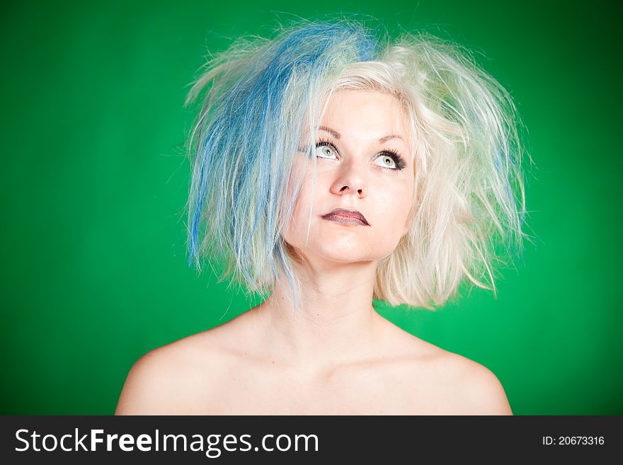 Crazy girl looking up with multicolor hair in tulle;. Crazy girl looking up with multicolor hair in tulle;