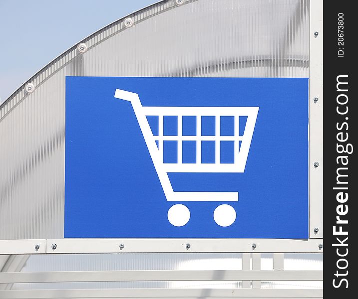 White shopping cart icon on a blue background