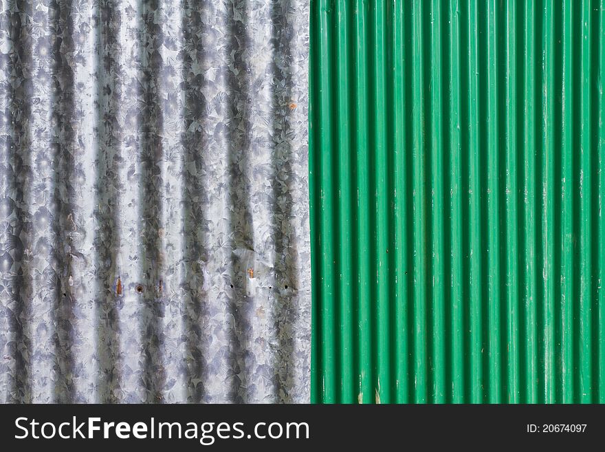 Gray and green corrugated iron's wall. Gray and green corrugated iron's wall