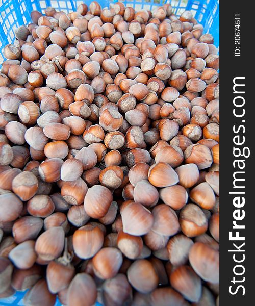 Large stack of brown hazelnuts. Large stack of brown hazelnuts