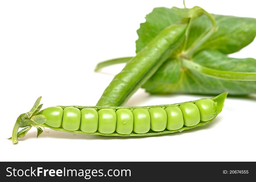 Fresh green pea pod and peas on white background. Fresh green pea pod and peas on white background.