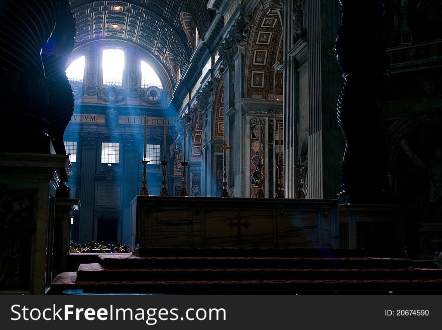 The mysterious morning sun light in San Pietro church in Vaticano. The mysterious morning sun light in San Pietro church in Vaticano