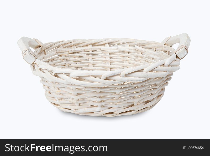 White empty wicker basket isolated on white
