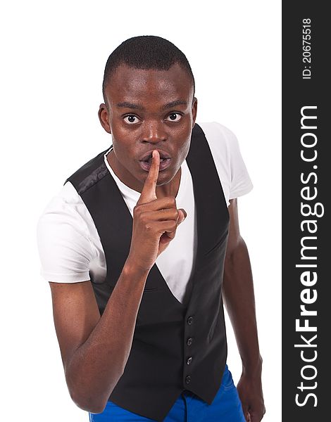 Young and beautiful black man doing silence sign